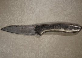 Cheburkov Knife Russian with Insert, Steel Damascus, Handle Black Marbled Carbon, Bronze Anodized Titanium