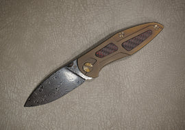Cheburkov Knife Toucan With Red and Black Inserts, Steel Damascus, Handle Bronze Titanium